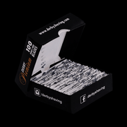 Box open of Derby Shaving blades with visible single white wrapping branding on a black background