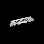 Metal razor blade with 'Dorco' branding on a black background