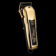 Gold and black Wahl Magic Clip cordless hair clipper on a black background Primos Barber Supplys