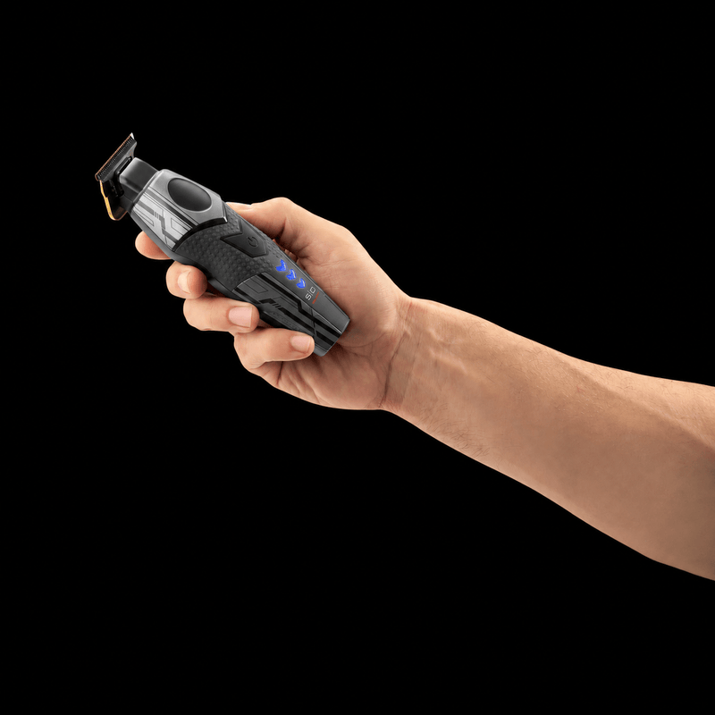 Hand holding the StyleCraft x 3Versince trimmer to show its size and grip
