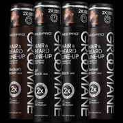 Four bottles of Groovane Hair & Beard Line-Up spray on a black background