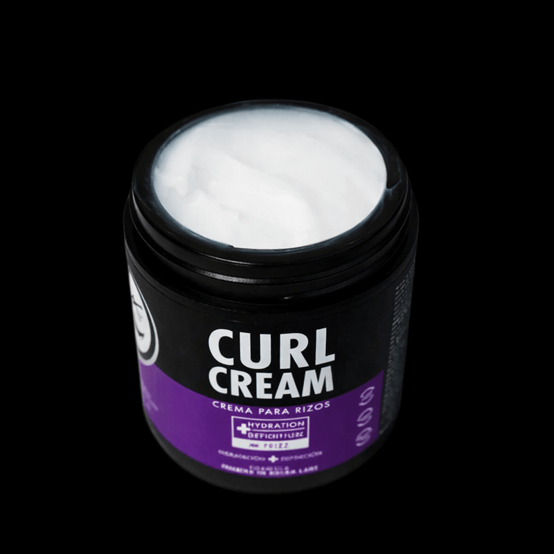 Top of jar showing white curl cream with visible logo on black background 