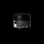 Rolda black container with the back of label showing on a black background