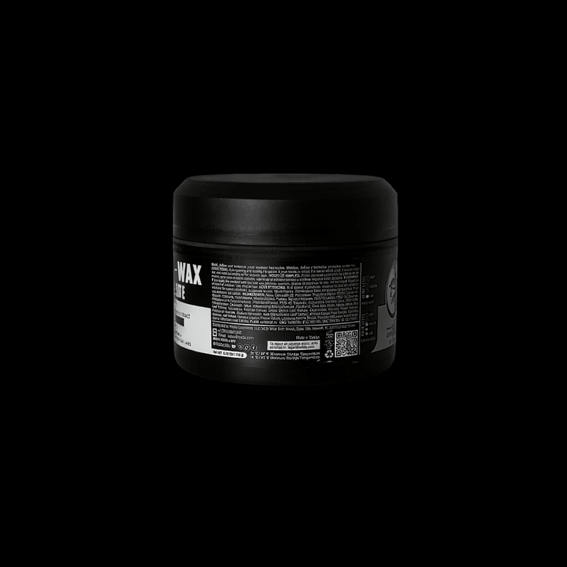 Rolda black container with the back of label showing on a black background