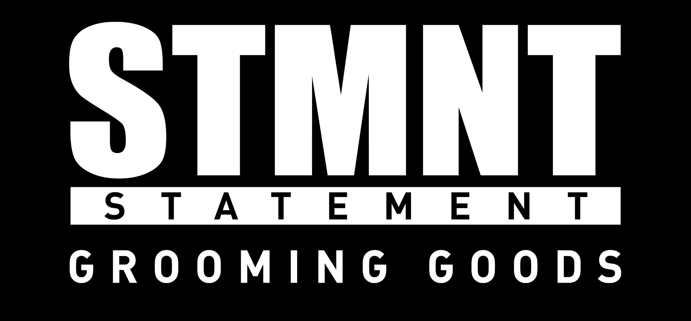 Logo of STMNT Statement Grooming Goods on a black background Primos Barber Supply