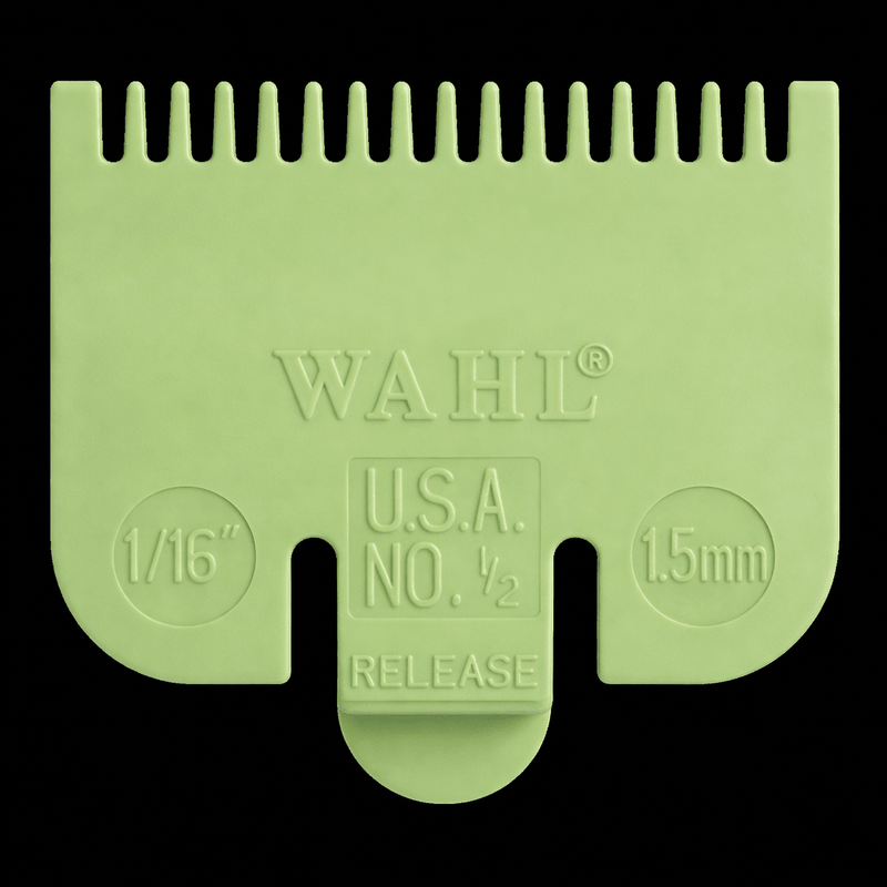 Green Wahl hair clipper comb on a black background