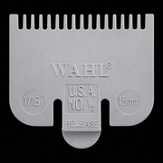 Gray Wahl hair clipper comb on a black background