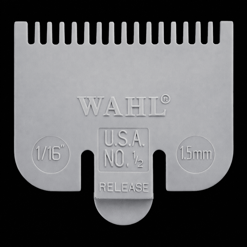 Gray Wahl hair clipper comb on a black background