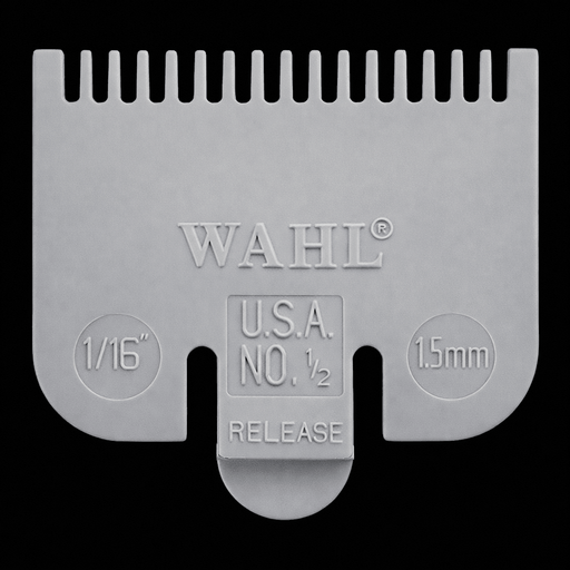 Gray Wahl hair clipper comb on a black background