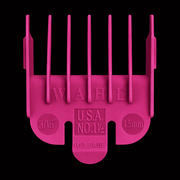 Pink Wahl hair clipper comb on a black background