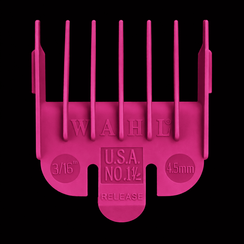 Pink Wahl hair clipper comb on a black background