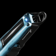 Super Vaper X clipper with metallic blue and black design on a black background