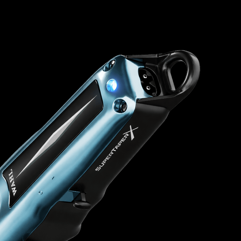 Super Vaper X clipper with metallic blue and black design on a black background