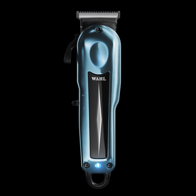 Blue Wahl super taper x clipper on a black background