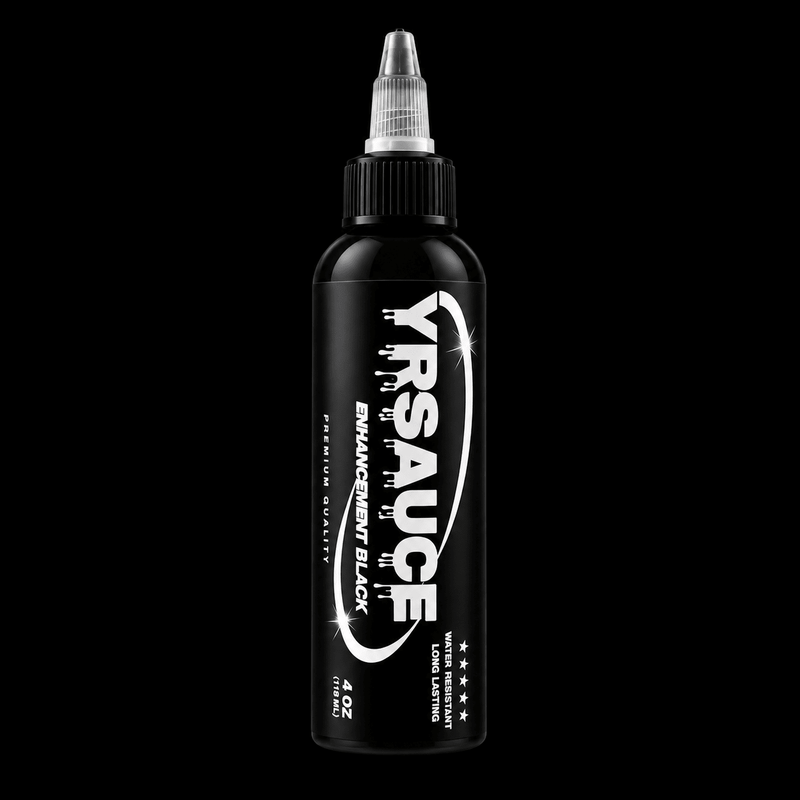 A bottle of Yrsauce Enhancer Black ink on a solid black background. The bottle is black with a white and silver label and a clear cap.