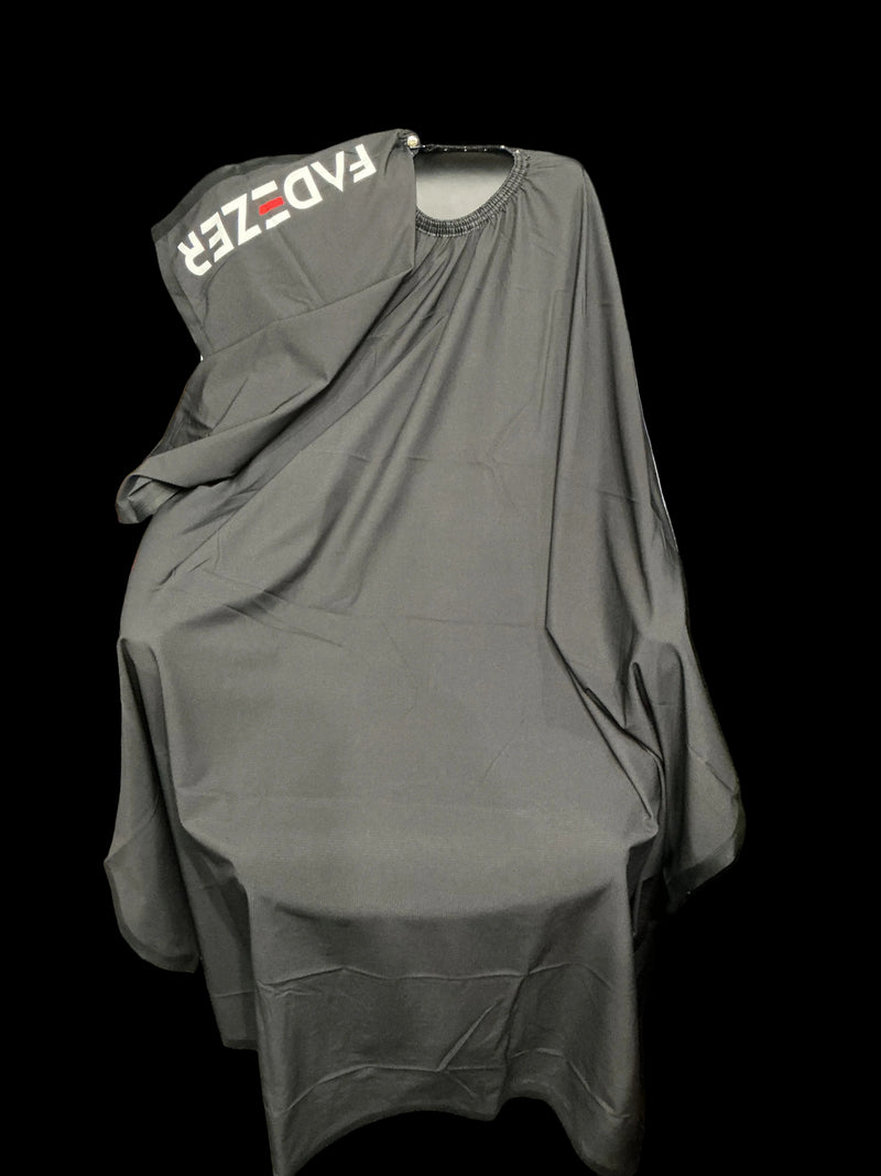 ALL BLK FAZZER CAPE, an all-black professional barber cutting cape