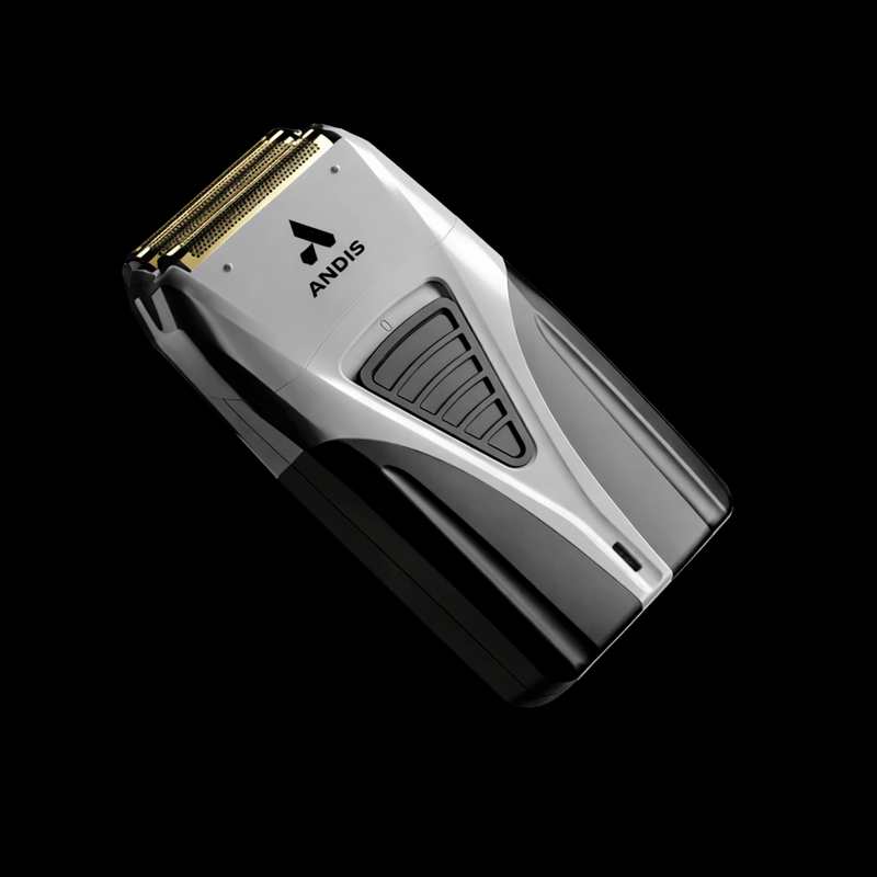 Andis electric razor on a black background