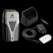 Andis electric razor with charging station, cable, and accessories on a black background