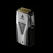 Andis electric shaver on a black background