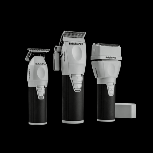 Set of three BaBylissPRO hair clippers on a black background