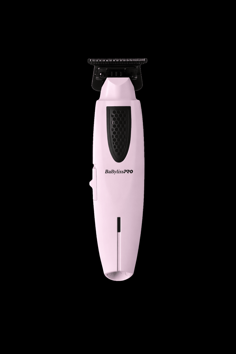 Pink hair trimmer with black accents on a black background