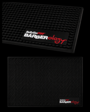 Black mat with Babyliss Pro Barberology logo on a black background