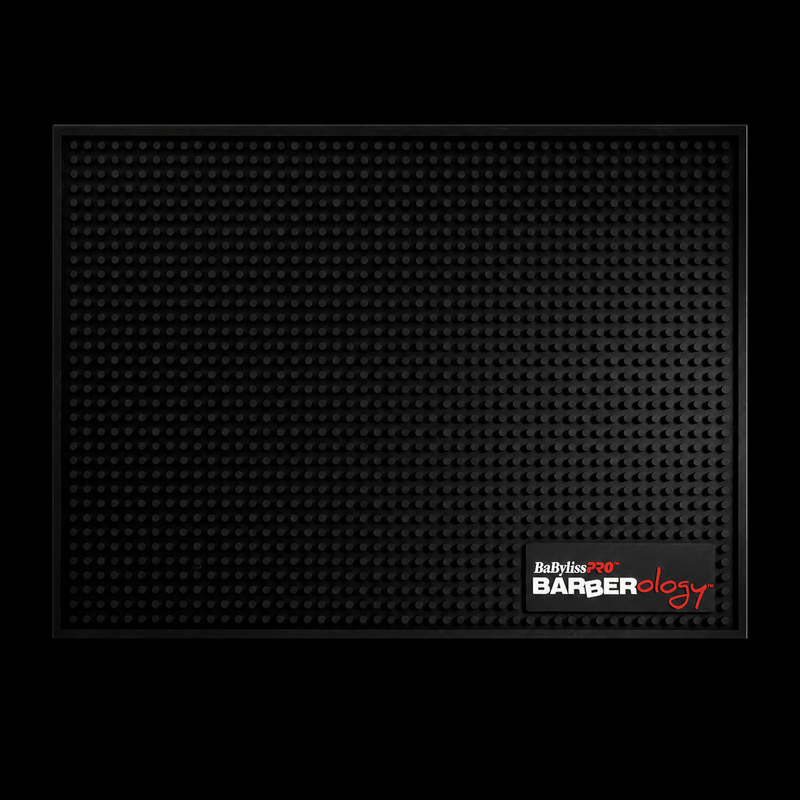 Black mat with Ballyhoo Pro Barberology logo on a black background
