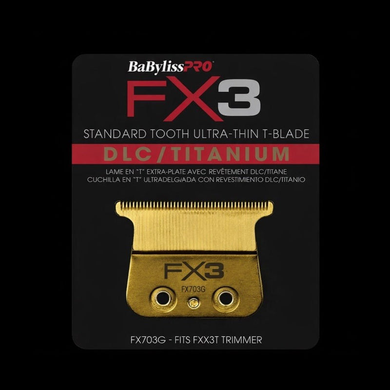 BaBylissPRO FX3 gold hair trimmer blade on a black background