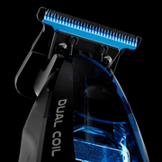 Close-up of BaBylissPRO FX95T Dual Coil Trimmer deep tooth T-blade and illuminated transparent housing