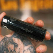 Barber holding BaBylissPRO FXONE replacement battery pack