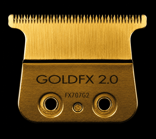 Gold hair clipper blade with 'GOLDFX 2.0' branding on a black background