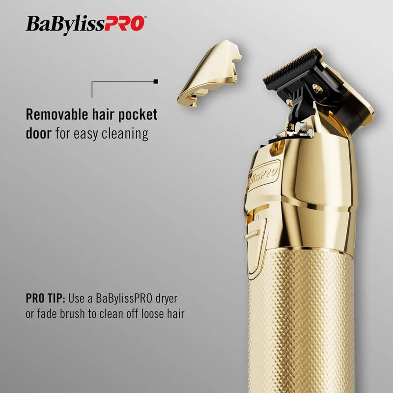 Gold hair trimmer with a removable hair pocket door on a gray background, featuring BaBylissPRO branding.