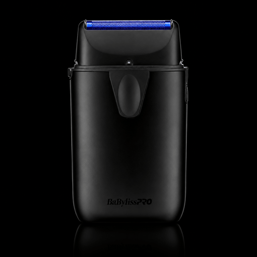 Black electric shaver with blue light on a black background