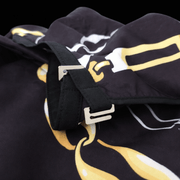 Barber cape material detail black and gold lightweight waterproof fabric professional barber cape Primos Barber Supply