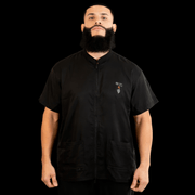 Black barber jacket front view lightweight professional uniform breathable barber wear Primos Barber Supply