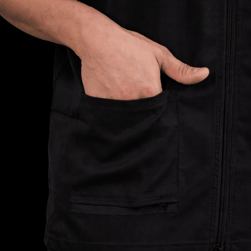 Black barber jacket pocket detail functional design for tools lightweight barber uniform Primos Barber Supply