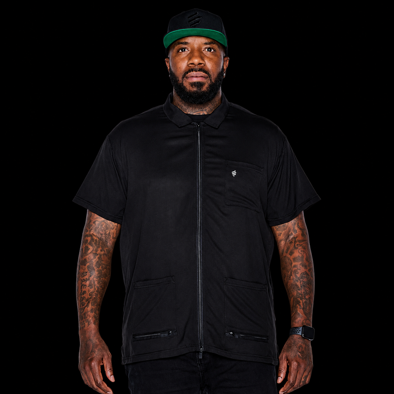 Barber wearing Barber Strong Barber Jacket Black at barbershop