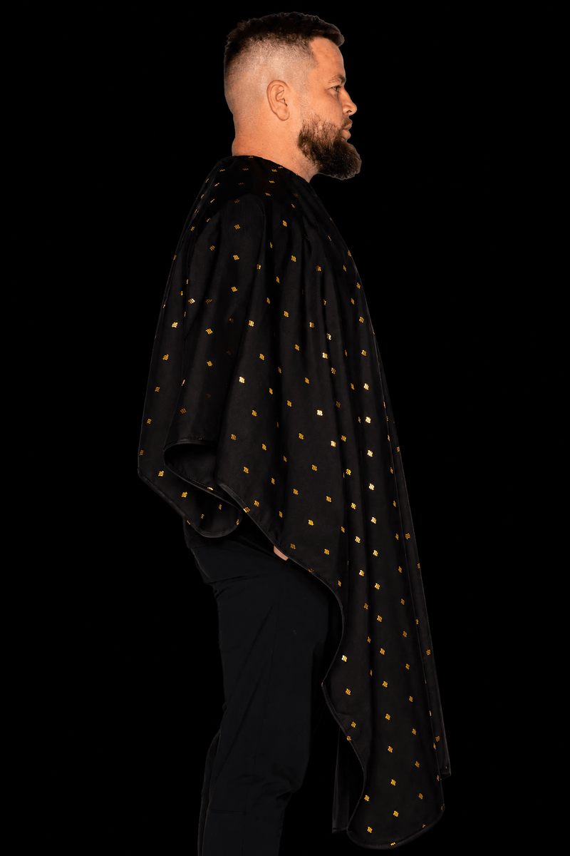 Barber Strong Shield Collection 24K Gold barber cape side profile view