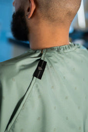Barber Strong Shield Collection army green barber cape neck closure detail