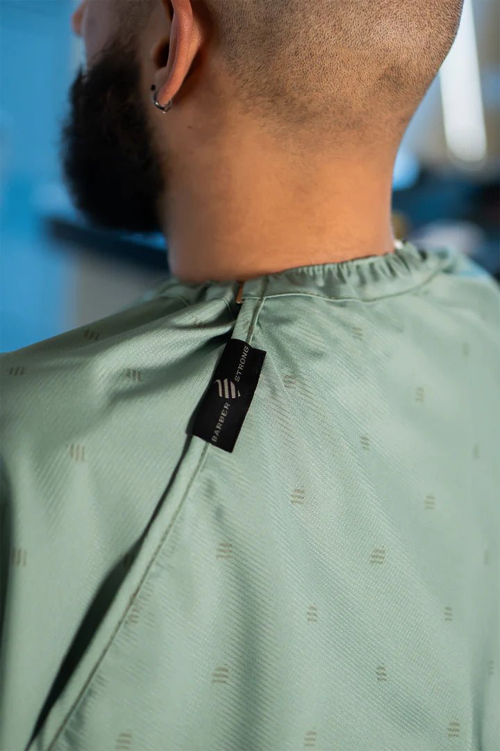 Barber Strong Shield Collection army green barber cape neck closure detail