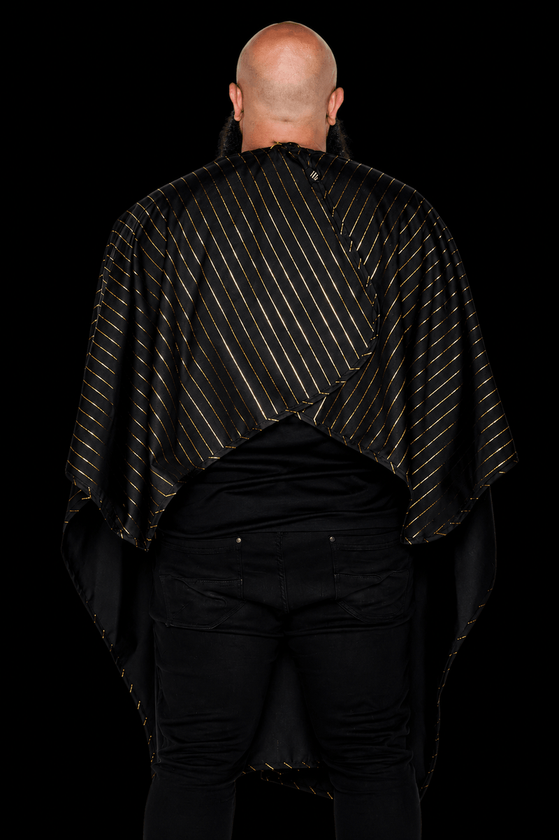 Barber Strong Shield Collection black barber cape with 24K gold pinstripes rear view
