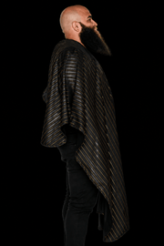 Barber Strong Shield Collection black barber cape with 24K gold pinstripes side profile view