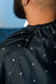 Barber Strong Shield Collection black barber cape neck closure detail