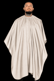 Barber Strong The Barber Cape Shield Collection barber cape in sand front view