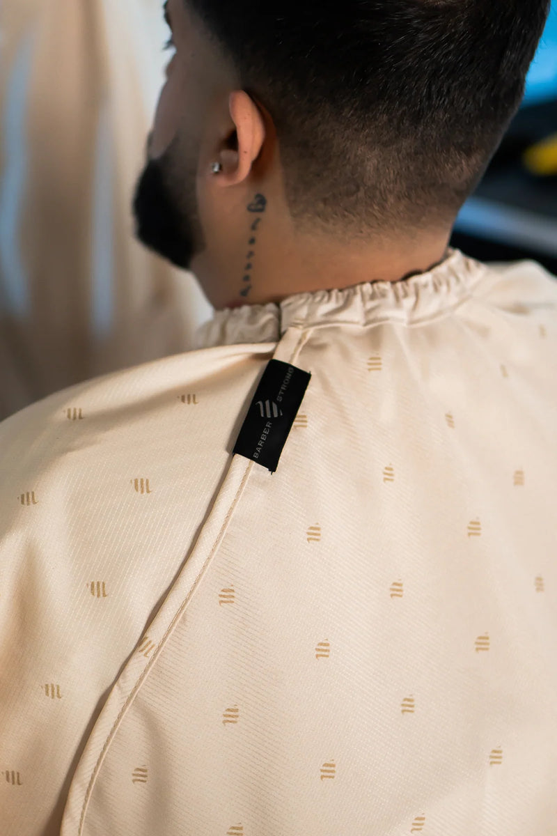 Barber Strong Shield Collection sand barber cape neck closure detail