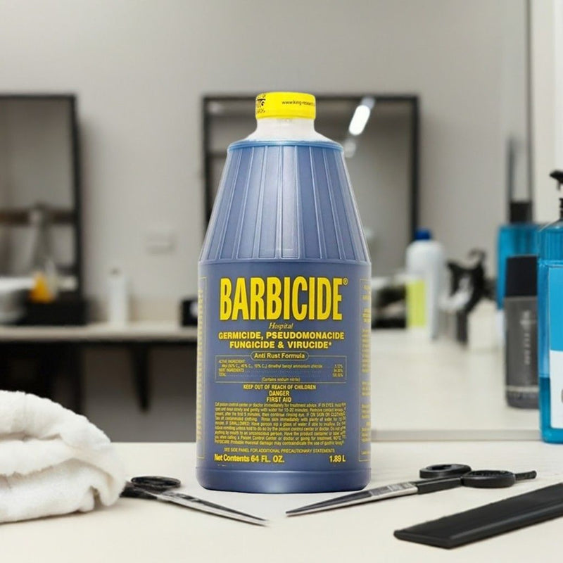 Barbicide disinfectant solution used for sanitizing barber tools in barbershop