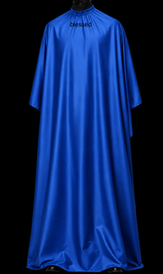 Blessed Capes Gravity barber cape in a solid blue color featuring lightweight water-resistant material and full professional coverage for barbers and stylists.