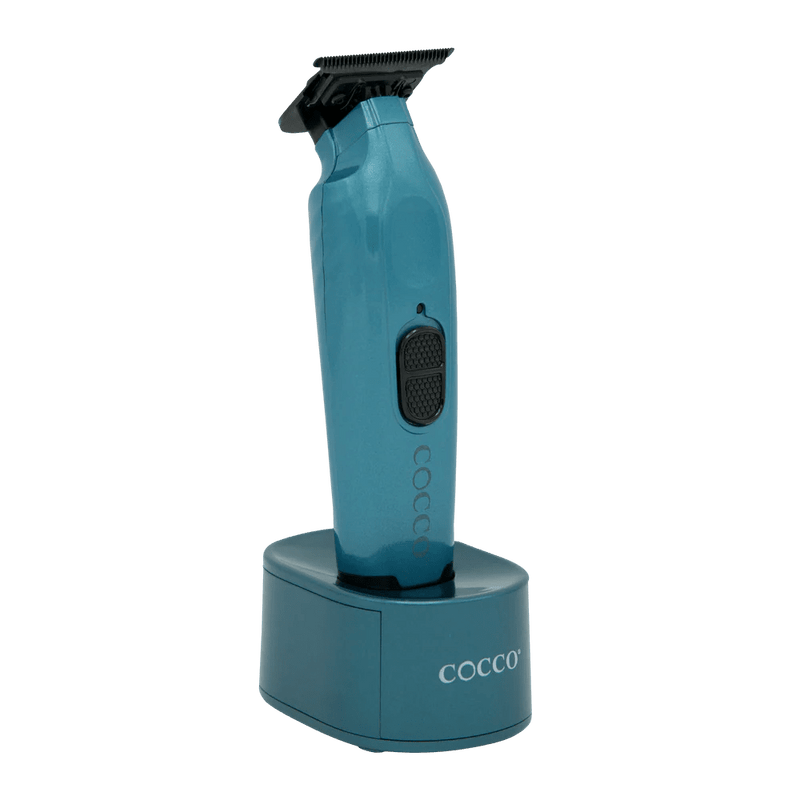 Blue hair trimmer with charging stand on a transparent background