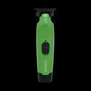 Green and black COCCO grooming tool on a white background