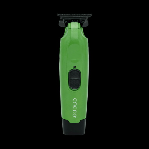 Green and black COCCO grooming tool on a white background